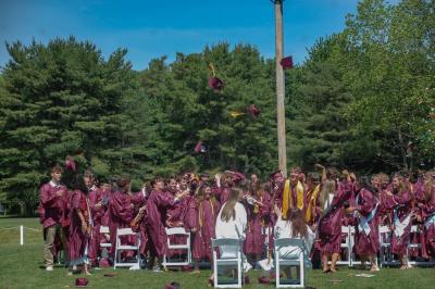 The graduates of the class of 2026 throw their caps in the air at Old Colony's commencement Sunday, May 31. Photos by Grace Roche