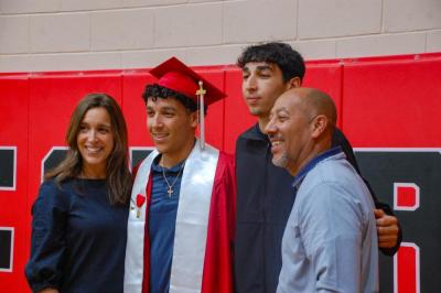Families filled the gymnasium after the ceremony to celebrate the grads. 