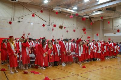 Graduating students toss their caps in the air at Old Rochester Regional High School's commencement on Saturday, May 30. Photos by Grace Roche