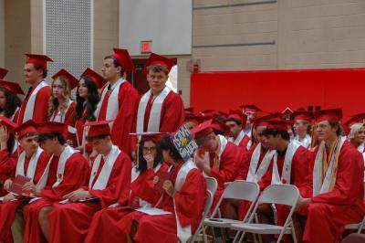 Students wait for their name to be called. 