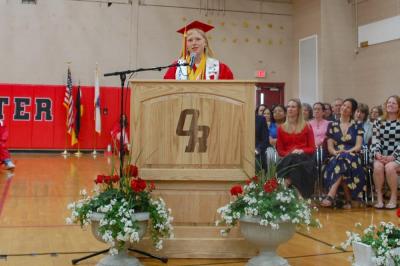 Valedictorian Ella Milhench gives a speech. 