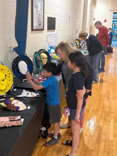 Some of the students displayed masks they made out of plaster. 