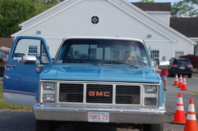 Susan O'Leary sits in her truck and revs the engine. 