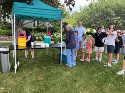 Kids — and parents — line up for ice pops. 