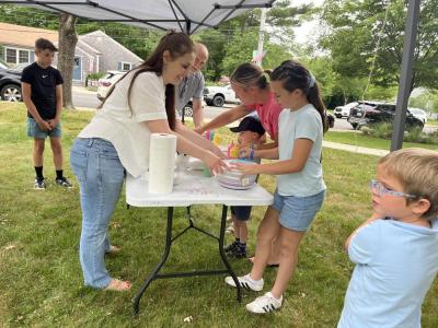 Kids work on an art project at the summer reading program. 