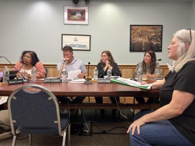 Kathy Abbruzzetti, right, defends her dog during a Tuesday, June 23 Select Board meeting. Photo by Grace Roche