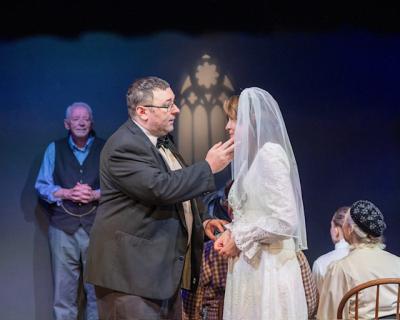 Matt Lynds's character Mr. Webb comforts his daughter Emily. 