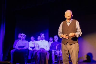 Donn Tyler as the Stage Manager monologues to the audience. 