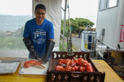 Dan Bell prepares food for the annual lobster dinner. 