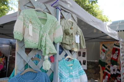 One vendor sold hand-knit clothing. 