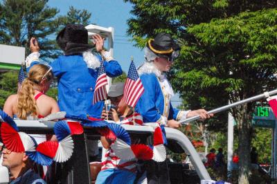Some parade participants dressed like it's 1776. 