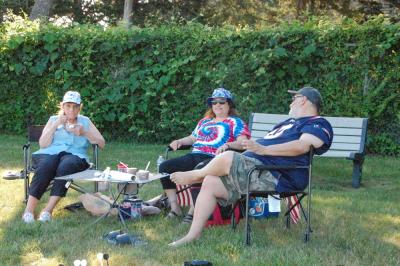 From left: Lynette Alves and Lori Mello, of Mattapoisett, and Paul Cafasso, of Canton, enjoyed a picnic meal together. 