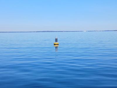 An offshore wave buoy floats off the coast of Mattapoisett in Buzzards Bay. Photo source: Stone Living Lab.