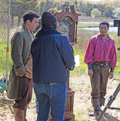 Director Anita Allison gives actors Tyson Brown, right, and Salustiano Berrios directions.