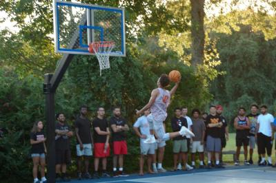 Jamaal Sims takes a jump shot. 