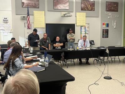Luis Rivera speaks at a June 3 Rochester School Committee meeting. Photo by Grace Roche