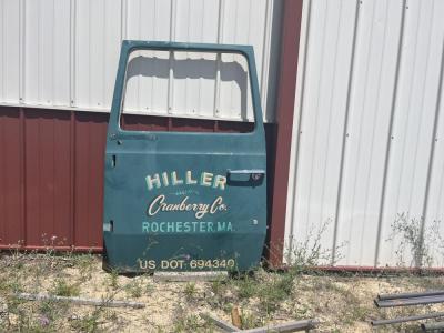 A car door from a now-closed cranberry farm sits on the property. 