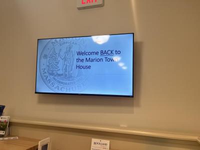A sign welcomes people to the newly-renovated space. 