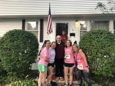 From left: Tocci, Kara Pernice, Susan's parents, Deborah Duffy and Sue Kindregan smile together before the team heads to the walk in 2019. 
