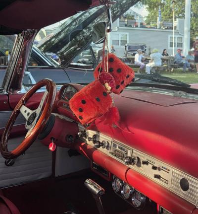 Many cars had fuzzy dice hung in the interior, which is an good luck token.