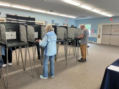 Voters cast their ballots during election day. 