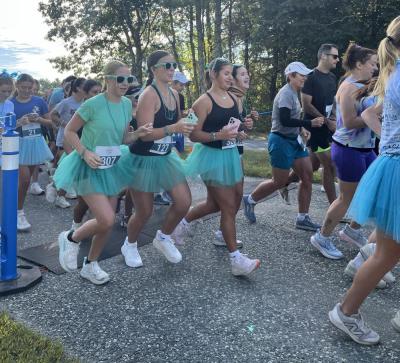 Many wore teal clothing and regalia to celebrate Maddie.