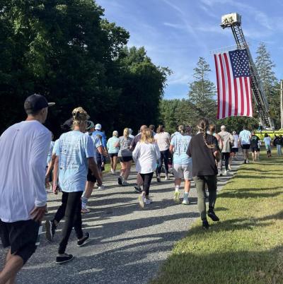 The 5K participants gathered at Dexter Field for the race.