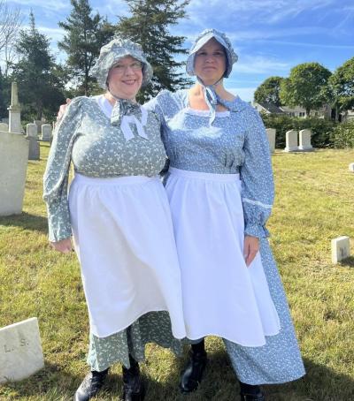 Jodie Camara, Mattapoisett assistant town clerk, and Cathy Heuberger, town clerk, dressed up as John Hammond’s two wives.