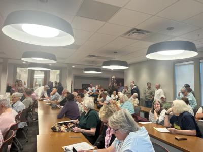 Over 70 people packed the Mattapoisett Fire Department for a Conservation Commission hearing Monday, Sept. 14. Photo by Grace Roche