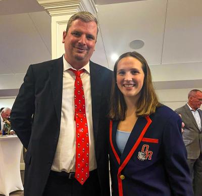 Superintendent Michael Nelson and sophomore Mollie Osetkowski.