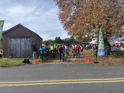 Cyclists wait to leave Red Brick Farm. 