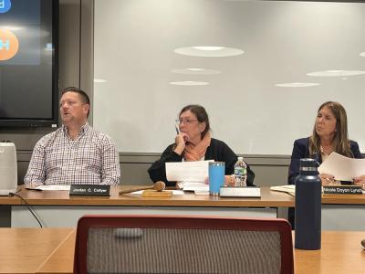From left: Select Board members Jordan Collyer, Jodi Bauer and Nicole Doyon Lynch at the Tuesday, Oct. 13 Select Board meeting. Photo by Grace Roche