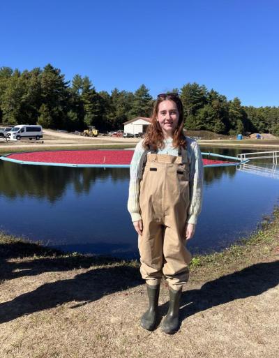 Editor Grace Roche dons waders before stepping into the bog. 