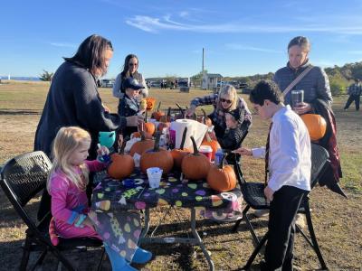 Kids and their families could paint pumpkins at the event. 