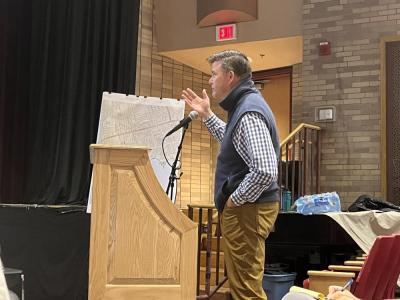 Todd Partridge speaks during the meeting. 