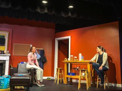Stephanie Lawrence's letter writer perches on a couch as she explains her situation to Sugar. 