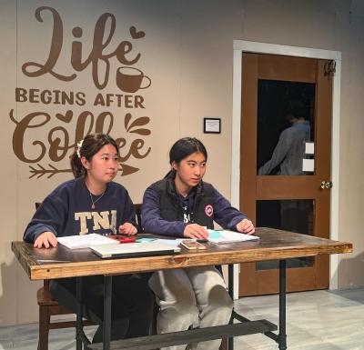 Gray Liu (left) and Dora Shen rehearse their scene.