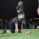 Owen Murray (back) and David Medeiros (front) watch the field. 