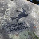 The text and image were originally painted by the owner of the property the rock sits on in 1990. Photos by Mari Huglin