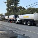 Construction vehicles at the intersection of Main Street and Spring Street.