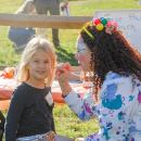 Lilly Bowser, age 5, gets her face painted. Lilly Bowser, age 5, gets her face painted.