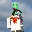 The Department of Public Works sent candy from the top of their truck to trick-or-treaters below. The Department of Public Works sent candy from the top of their truck to trick-or-treaters below.