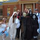 A group of trick-or-treaters poses for a scary photo.