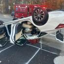 A Toyota Avalon containing a driver and one passenger rolls over due to a collision. Source: Marion Fire/EMS Facebook A Toyota Avalon containing a driver and one passenger rolls over due to a collision. Source: Marion Fire/EMS Facebook