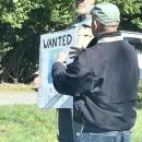 The protestor was photographed at the intersection of U.S. Route 6 and North Street and Shipyard Park. The protestor was seen at the intersection of U.S. Route 6 and North Street and Shipyard Park.