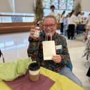 A resident is pleased with his snowman from the raffle.