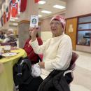 A winner is happy with her prize.