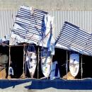 Roof of Triad Boatworks partially torn off in storm. Source: David Curran