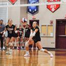 Lucy Lombard returns the ball.