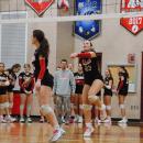 Carly Mello returns a serve with a bump.